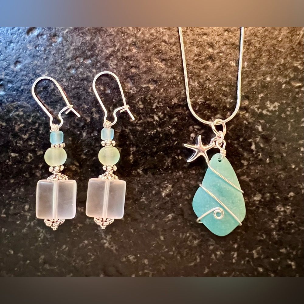 Blue sea glass charm necklace on 16-inch chain with matching earrings.